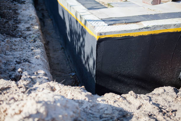 Professional Waterproofing technician working in Warren, MI